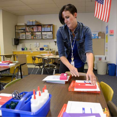 Al Hartmann  |  The Salt Lake Tribune
First-year teacher Erika Williams finishes setting up her second-grade classroom for 24 students at Westbrook Elementary in Taylorsville on Tuesday, Aug. 18.  She was a student teacher at the school last year and was asked to fill a teaching position for the 2015-16 school year.  Granite School District starts Wednesday.