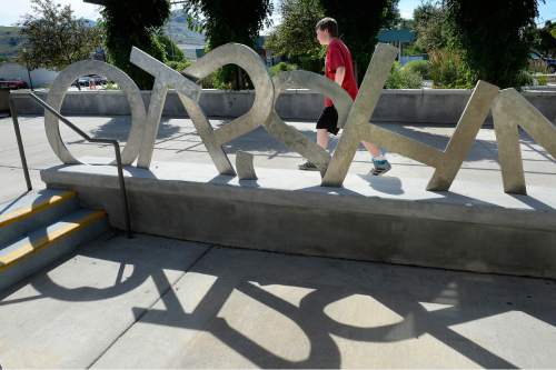 Scott Sommerdorf   |  The Salt Lake Tribune
Decorative letters on the west side of the Magna Library, 2675 S 8950 W, Thursday, July 2, 2015.