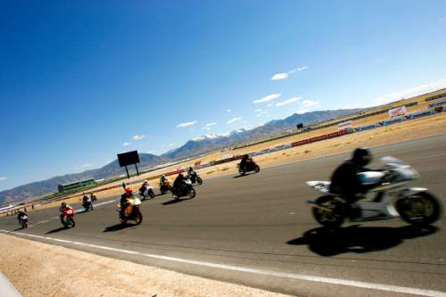 Tooele, UT--9/17/06--2:34:14 PM-
Motorcycle racers start the 6th race of the Bonneville Vintage GP at Miller MotorSports Park. This was an 8-lap race.
The classification for these bikes is BOT F1/F3//SOS 2-STK/PROD SINGLES.

*****
Sunday is the final day of the Bonneville Vintage Motorcyles races at Miller Motorsports Park.

Chris Detrick/Salt Lake Tribune
File #_2CD3460