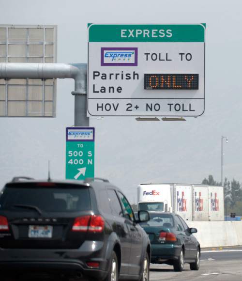 Al Hartmann  |  The Salt Lake Tribune
Traffic moves along I-15 northbound between Salt Lake City and North Salt Lake.  HOV lane at far left.
