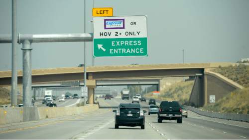 Al Hartmann  |  The Salt Lake Tribune
Traffic moves along I-15 northbound between Salt Lake City and North Salt Lake.  HOV lane at far left.