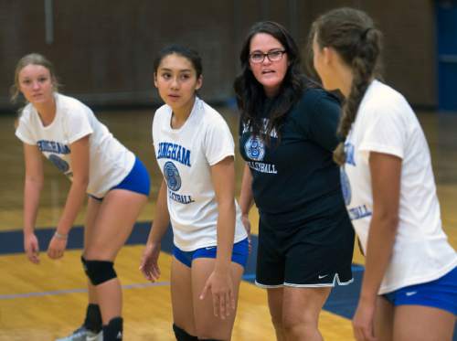 Steve Griffin  |  The Salt Lake Tribune

Members of the Bingham High School volleyball team listen to head coach Melissa Glasker during practice at the South Jordan, Utah high school Monday, August 17, 2015.  l