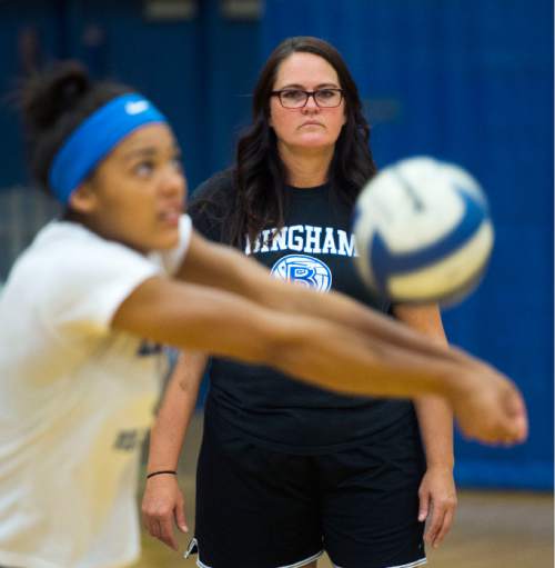 Steve Griffin  |  The Salt Lake Tribune

Bingham High School volleyball player Torre Glasker passes the ball as her mother, and head coach, Melissa Glasker, watches during practice at the South Jordan, Utah high school Monday, August 17, 2015.  l