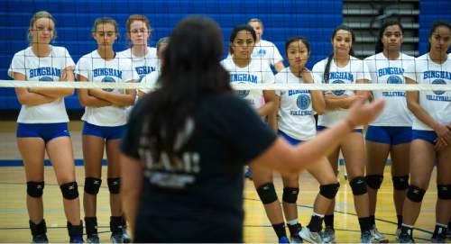 Steve Griffin  |  The Salt Lake Tribune

The Bingham High School volleyball listens to head coach Melissa Glasker during practice at the South Jordan, Utah high school Monday, August 17, 2015.  l