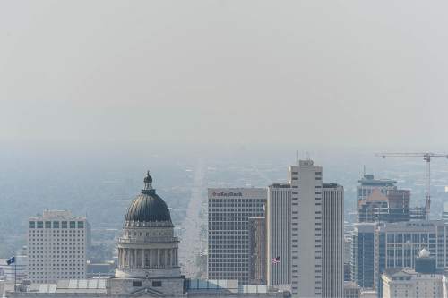 Trent Nelson  |  The Salt Lake Tribune
Smoke and haze fille the Salt Lake valley, Tuesday August 18, 2015.