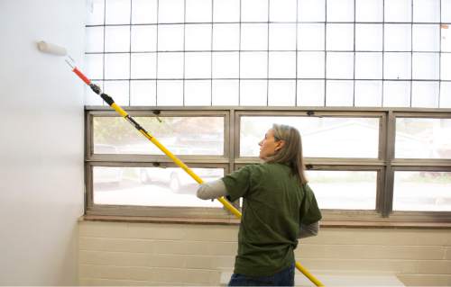 Rick Egan  |  The Salt Lake Tribune
Salt Lake Regional Medical Center volunteer Debra Hampton, paints a room on Monday in the old Guadalupe school building, which will be the new site for The INN Between, Utah's first non-profit house for homeless people in Salt Lake City.