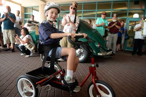 Al Hartmann  |  The Salt Lake Tribune
Willis Wallin is all smiles as he  tries out his new adaptive bike at Shriners Hospitals for Children in Salt Lake City on Sunday, Aug. 23.  He was one of four children to receive a bike, purchased by the Shriners with proceeds from their annual "Kruisers for Kids" car show fundraiser.