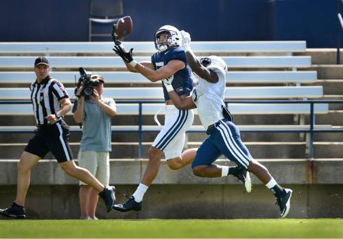Scott Sommerdorf   |  The Salt Lake Tribune
BYU WR Nick Kurtz hauls in this long pass from QB Taysom Hill during practice, Saturday, August 22, 2015.