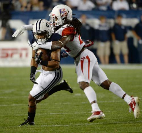 Steve Griffin  |  The Salt Lake Tribune


Houston Cougars defensive back Trevon Stewart (23) tackles BYU Cougars wide receiver Trey Dye (86) in the second half of the game between BYU and Houston and LaVell Edwards Stadium in Provo, Thursday, September 11, 2014.