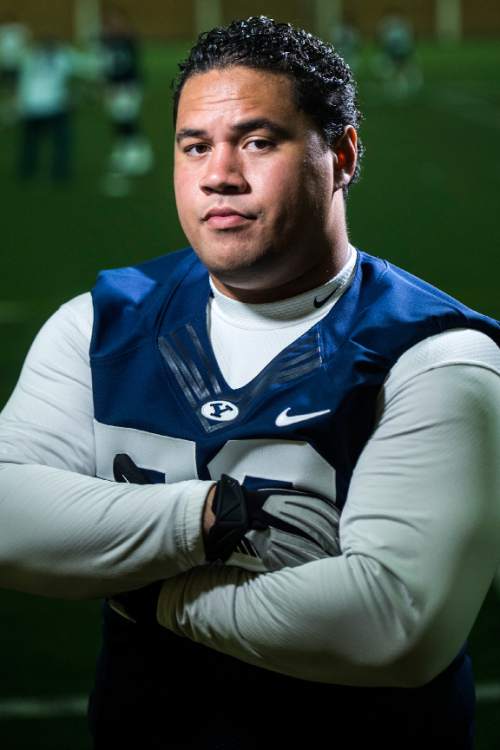 Chris Detrick  |  The Salt Lake Tribune
Brigham Young Cougars offensive lineman Tuni Kanuch (78) poses for a portrait Wednesday August 12, 2015.