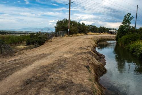 Chris Detrick  |  The Salt Lake Tribune
The area of the West Salem Canal that had breached  earlier in the day, and since fixed, Tuesday August 25, 2015.