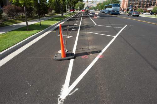 Rick Egan  |  The Salt Lake Tribune

New bike lanes on 200 West from South Temple to 900 South. Wednesday, August 26, 2015.