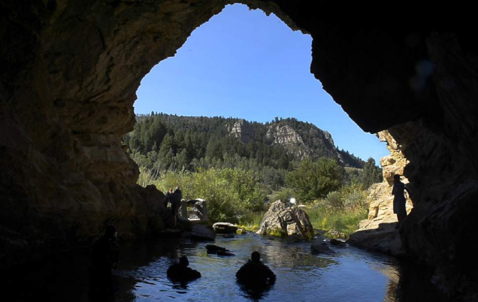 Leah Hogsten  |  The Salt Lake Tribune
Cave divers Wendell Nope and Richard Lamb, DVM surface in a pool on Wednesday after exiting the cave they discovered in Logan Canyon in 2007.  The two have named the cave Ichiban Cave as well as several of the features found in the 2,100-foot length passage.