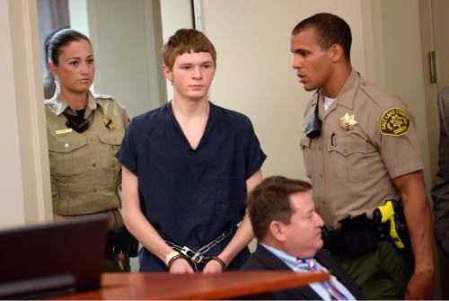 Al Hartmann  |  The Salt Lake Tribune
Darwin Christopher Bagshaw, now 18, attends a disposition hearing before 3rd District Judge James Blanch in Salt Lake City Friday July 31.  A jury trial date was set for the end of the year. 
The teen is accused of killing his 15-year-old girlfriend, Anne Kasprzak, in March 2012, when he was 14.
Bagshaw was originally charged as a juvenile, but a juvenile court judge in April transferred it to adult court.