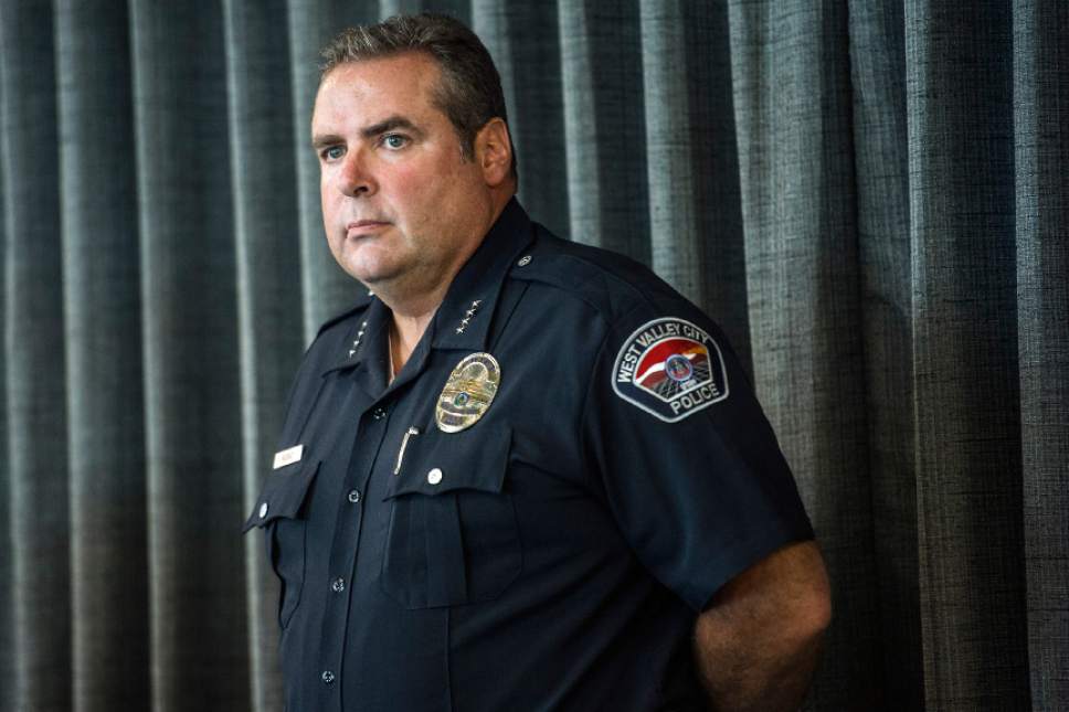 Chris Detrick  |  The Salt Lake Tribune
West Valley City Police Chief Lee W. Russo listens as West Jordan Chief of Police Douglas L. Diamond speaks during a press conference at the West Jordan Police Department Friday August 28, 2015.