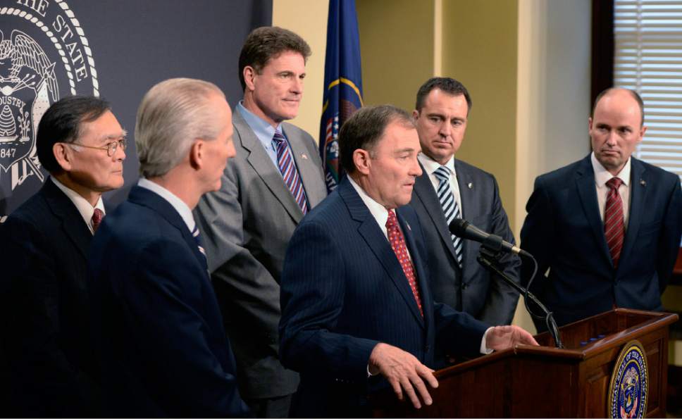 Al Hartmann  |  Tribune file photo
Gov. Gary Herbert, front middle, and members of the so-called Gang of Six are still working behind the scenes on a Medicaid exansion plan.But details are hard to get consensus on. One proposal floated is to increase the sales tax on food.