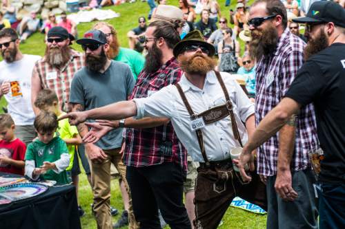 Chris Detrick  |  The Salt Lake Tribune
Sean Jacob tries to impress the judges during the 2nd Annual Beard & Moustache Competition during the 43rd Annual Oktoberfest Celebration at Snowbird Ski & Summer Resort Saturday August 29, 2015.