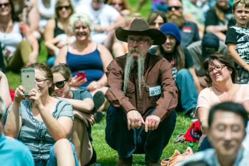 Chris Detrick  |  The Salt Lake Tribune
Steven Ashdown watches the 2nd Annual Beard & Moustache Competition during the 43rd Annual Oktoberfest Celebration at Snowbird Ski & Summer Resort Saturday August 29, 2015.
