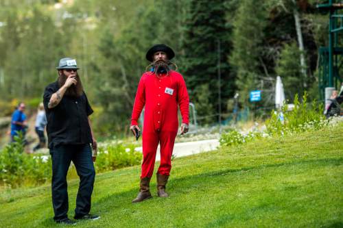 Chris Detrick  |  The Salt Lake Tribune
Nick Bacon, left, and Nicholas Beadles wait to compete in the 2nd Annual Beard & Moustache Competition during the 43rd Annual Oktoberfest Celebration at Snowbird Ski & Summer Resort Saturday August 29, 2015.