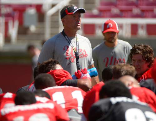 Leah Hogsten  |  The Salt Lake Tribune
Utah's head coach Kyle Whittingham talks to the team after practice. University of Utah football team held its first fall scrimmage at Rice-Eccles Stadium, Thursday, August 13, 2015.