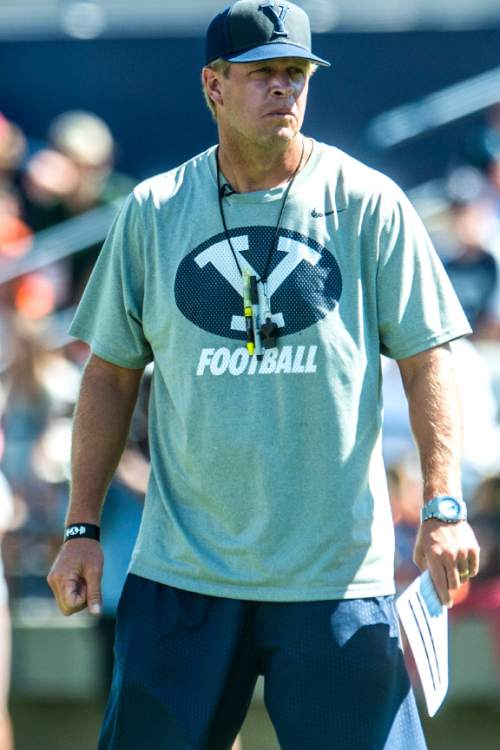 Chris Detrick  |  The Salt Lake Tribune
Bronco Mendenhall watches during a scrimmage at LaVell Edwards Stadium Saturday August 15, 2015.