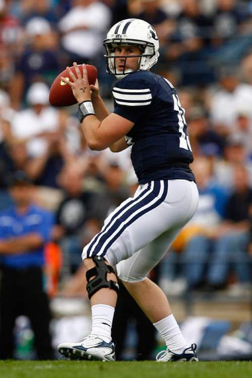 Provo, UT--9/22/07--12:13:02 PM--
BYU QB Max Hall #15 looks to pass during the 1st half of the game at LaVell Edwards Stadium.

******************************
BYU opens Mountain West Conference play against unbeaten Air Force. Cougars have lost two straight and allowed 55 points last week. This would be a big win for several reasons, among them stopping their losing streak and keeping alive their conference title hopes. Last conference loss was to Utah in 2005.

Chris Detrick/The Salt Lake Tribune
File #_1CD7287