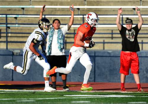 Scott Sommerdorf   |  The Salt Lake Tribune
Timpview WR Fielding Wallace raced to a long TD on the first series of the game for Timpview, but Lone Peak led Timpview 14-7 at the half in Provo, Friday, August 28, 2015.