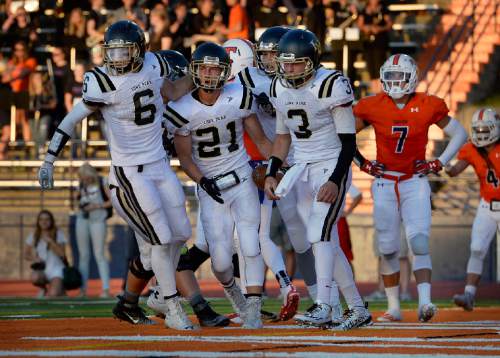 Scott Sommerdorf   |  The Salt Lake Tribune
Lone Peak RB Jackson McChesney scored the go-ahead TD late in the second quarter as Lone Peak led Timpview 14-7 at the half in Provo, Friday, August 28, 2015.