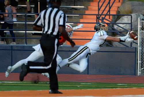 Scott Sommerdorf   |  The Salt Lake Tribune
Lone Peak WR Johnny Christensen just missed this TD catch during first half play. Lone Peak led Timpview 14-7 at the half in Provo, Friday, August 28, 2015.
