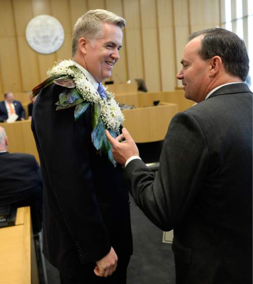 Francisco Kjolseth | The Salt Lake Tribune
John W. Huber is greeted by Senator Mike Lee during the start of the swearing in ceremony for Huber as U.S. Attorney for Utah at the new Federal Courthouse in Salt Lake City on Monday, Aug. 31, 2015.  John W. Huber and his wife Lori were presented with Tongan flower Lei's made by Sela Tauteoli, in honor of Huber's swearing in.