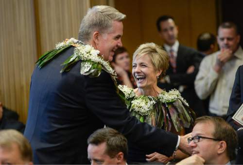 Francisco Kjolseth | The Salt Lake Tribune
John W. Huber, joined by his wife Lori is greeted by friends and family before being sworn in as U.S. Attorney for Utah at the new Federal Courthouse in Salt Lake City on Monday, Aug. 31, 2015.  John W. Huber and his wife Lori were presented with Tongan flower Lei's made by Sela Tauteoli, in honor of Huber's swearing in.
