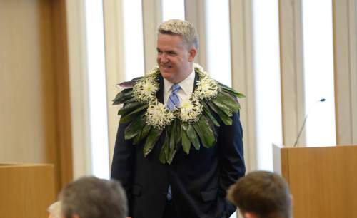 Francisco Kjolseth | The Salt Lake Tribune
John W. Huber is greeted by friends and family before being sworn in as U.S. Attorney for Utah at the new Federal Courthouse in Salt Lake City on Monday, Aug. 31, 2015.  John W. Huber and his wife Lori were presented with Tongan flower Lei's made by Sela Tauteoli, in honor of Huber's swearing in.