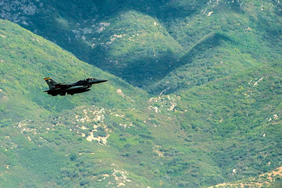 Chris Detrick  |  The Salt Lake Tribune
A F-16 flies above Hill Air Force Base last year.