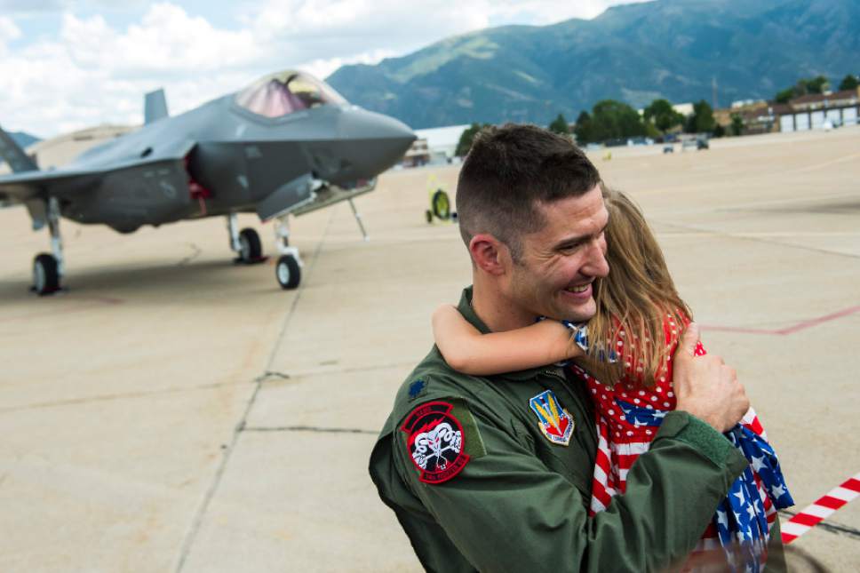 Chris Detrick  |  The Salt Lake Tribune
Lt. Col. Yosef Morris, 34th Fighter Squadron Director of Operations, hugs his daughter Makena, 5, in front of a F-35 at Hill Air Force Base Wednesday September 2, 2015.