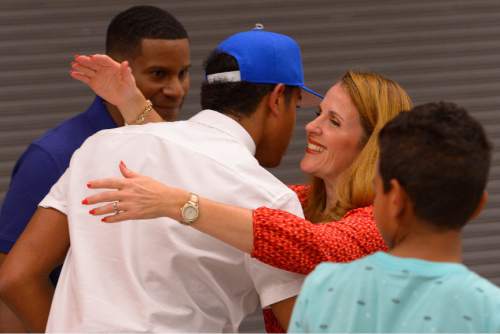 Leah Hogsten  |  The Salt Lake Tribune
Frank Jackson is congratulated by his father Alvin and mother Juleen after Jackson's announcement. Lone Peak High School basketball guard Frank Jackson, one of the top basketball recruits in the country, announced his decision to play for Duke University, his choice over Stanford, Utah and BYU, Tuesday, September 1, 2015.
