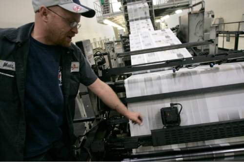 |  Tribune File Photo

Journeyman pressman Matt Larsen monitors the USA Today printing on the TKS press Wednesday, March 11, 2009 at MediaOne in West Valley City. MediaOne prints many papers and products including The New York Times, USA Today, The Deseret News, Provo Daily Herald and The Salt Lake Tribune.
