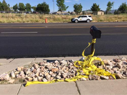 Rick Egan  |  The Salt Lake Tribune

A UHP Trooper was shot at 2:20 am, in a construction zone on Highway 193 near the intersection with Hill Field Road. Friday, August 28, 2015.
