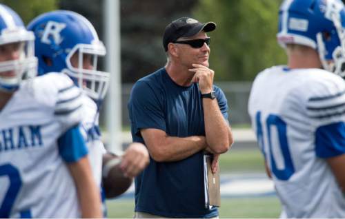 Steve Griffin  |  The Salt Lake Tribune

Bingham High head football coach John Lambourne keeps a close eye on his offense as they run plays during practice on the Bingham High School football field in South Jordan, Utah on Wednesday, August 26, 2015. Lambourne was named head coach following the retirement of Dave Peck and takes over one of the state's most successful football programs.
