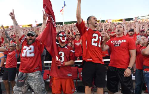 Francisco Kjolseth | The Salt Lake Tribune
Utah fans cheer on the team as they battle the Michigan Wolverings in game action at Rice Eccles Stadium on Thursday, Sept. 3, 2015.