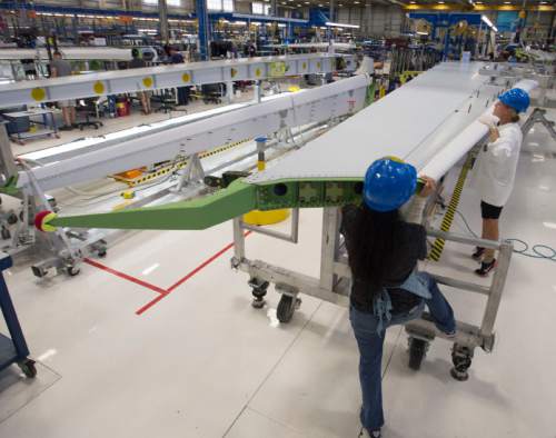 Steve Griffin  |  The Salt Lake Tribune

Mechanics work on a horizontal stabilizer for a Boeing 787 Dreamliner at Boeing in Salt Lake City, Thursday, September 3, 2015.