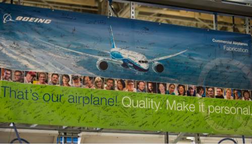 Steve Griffin  |  The Salt Lake Tribune

A poster with employees signatures hangs above the  vertical fin assembly line for a Boeing 787 Dreamliner at Boeing in Salt Lake City, Thursday, September 3, 2015.