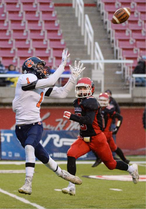 Francisco Kjolseth  |  The Salt Lake Tribune
Brighton's Simi Fehoko (1) pulls in a touchdown pass ahead of Jace Miller (15) of American Fork in class 5A state football semifinal at Rice Eccles Stadium on Thursday, Nov. 13, 2014.