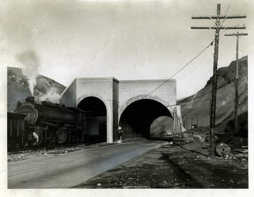 Tribune file photo

The original caption on this 1941 photo says: "Utah Copper Company completes link in construction program. This 228-foot underpass is at mouth of Bingham canyon. An earth fill will be made over the structure and a railroad line built on it."