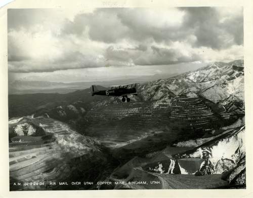 Tribune file photo

The original caption on this 1934 photo says: "The airline annihilates distance. As the mail flies it is but a few hours from Salt Lake to san Francisco. Picture shows liner over Bingham copper mines ona regular trip across the continent."