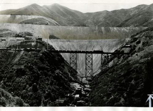 Tribune file photo

The original caption on this 1941 photo says: "Typical Bingham scene is long ore train crossing one of many gulches on high steel trestles. Shown here is Markham gulch bridge."
