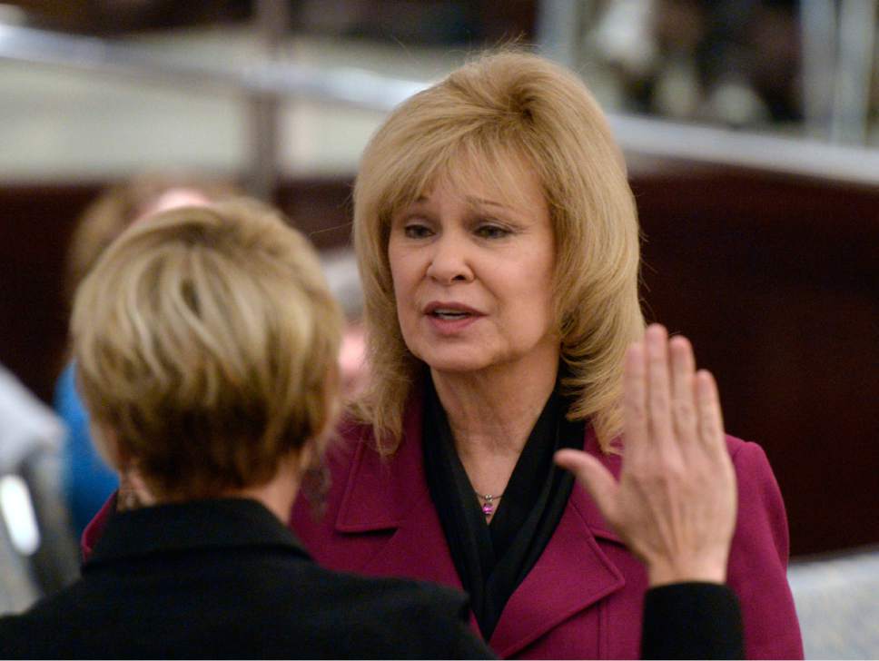 Al Hartmann  |  The Salt Lake Tribune
Oath of office is administered to long-time Salt Lake County Clerk, Sherrie Swensen at the Salt Lake County Council chamber Monday January 5.