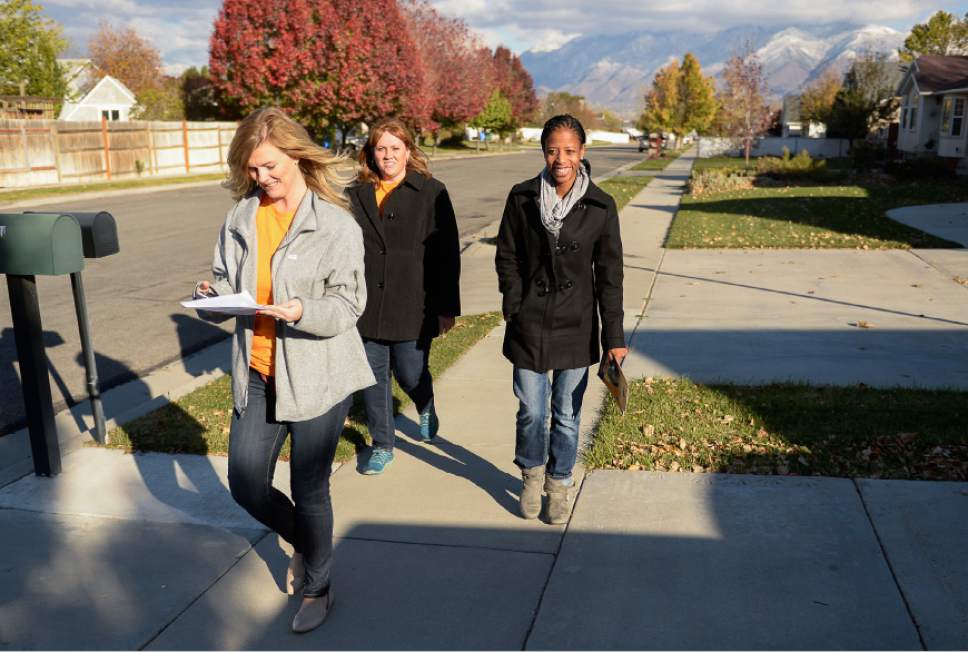 Francisco Kjolseth  |  The Salt Lake Tribune
Republican candidate for Congress Mia Love canvasses neighborhoods in Riverton alongside volunteer Evelyn Everton, left, and operations director Laurel Price, center, to get out the vote before Election Day.