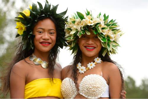 Leah Hogsten  |  The Salt Lake Tribune
l-r Sisters Hina Vainuku, 12, and Telesia Vainuku, 13, competed against each other during a Tahitian dance-off at Polynesian Days at Thanksgiving Point that showcases the cultures, foods, entertainment and diversities of the peoples of the Polynesian islands, September 5, 2015.