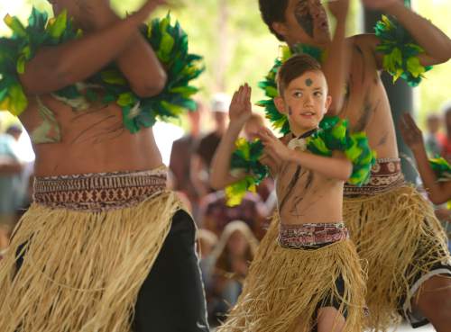 Leah Hogsten  |  The Salt Lake Tribune
Fiji Warrior Maddox Kapono with the Halau 'O Ka'ipolani dance group performs a warrior dance at the Polynesian Days at Thanksgiving Point that showcases the cultures, foods, entertainment and diversities of the peoples of the Polynesian islands, September 5, 2015.