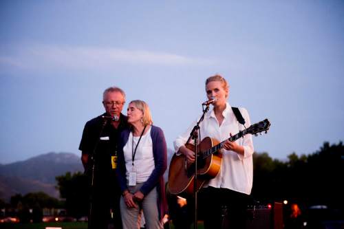Jeremy Harmon  |  The Salt Lake Tribune

Lovisa Samuelsson, the great grandniece of Joe Hill, performs a song about the last minute of Hill's life along with her mother, Pia Samuelsson and Rolf Hägglund during a concert in Sugar House Park on Sept. 5, 2015. The concert was organized by the Joe Hill Organizing Committee as a way to honor the life and legacy of the labor icon who was executed nearly 100 years ago on November 19, 1915.